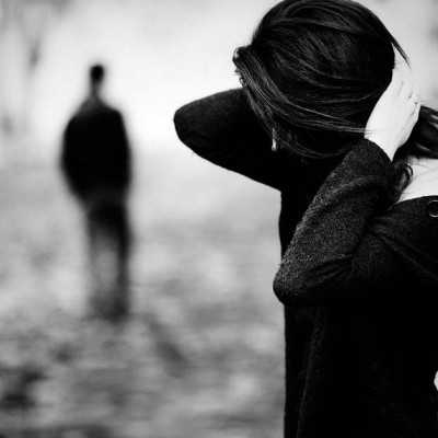 Should You Seek Closure From Your Ex After A Breakup? woman-looking-back-at-man