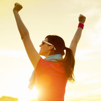 How to Make Your Ex Miss You Like Mad Girl with arms raised after a run