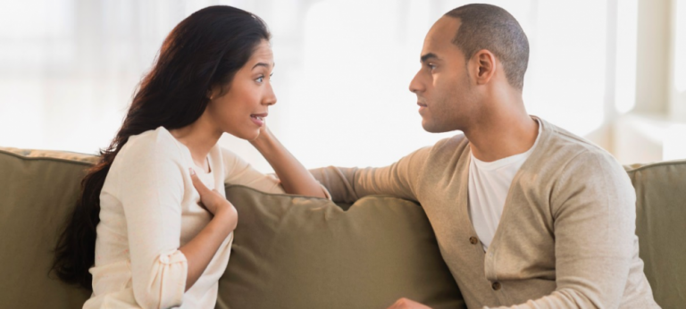 young couple talking on a couch. Woman speaking in "I" voice.