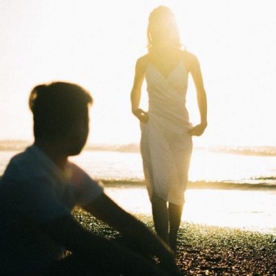 My NEW #1 Tip To Get Your Ex Back man sitting on sunset beach with woman approaching