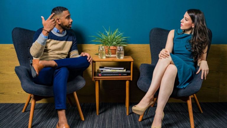 man-talking-to-woman