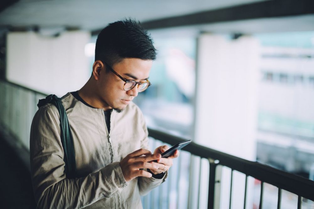 young-man-texting