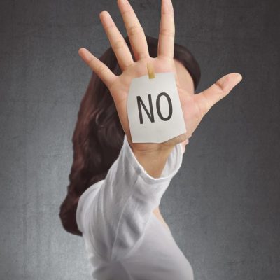 Saying No To Your Ex Makes Them Want You Back woman-with-hand-covering-face-with-no-written-on-it