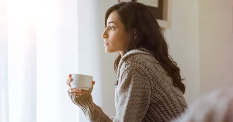 woman-staring-out-window