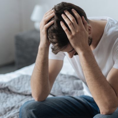 Win Back Your Ex Even If They Say "Never Again" despondent-man-on-bed