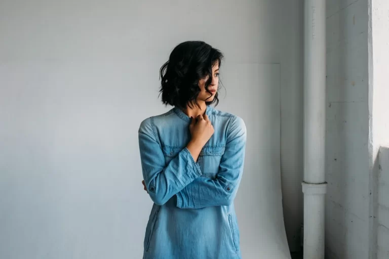 worried-woman-standing-alone